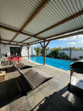 Elegant house close to the beach in Pointe aux Sables, with pool